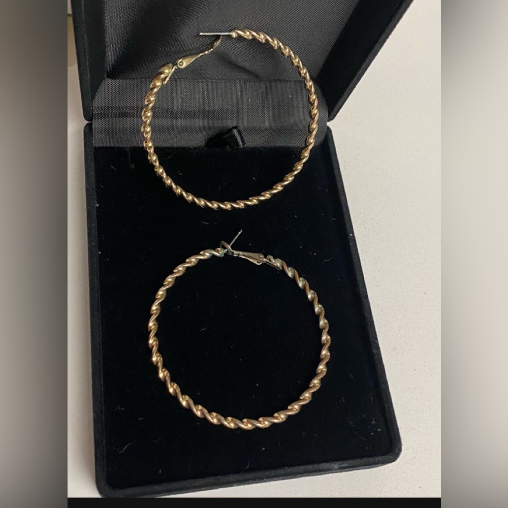 Gold Tone Metal Twisted Hoop Earrings